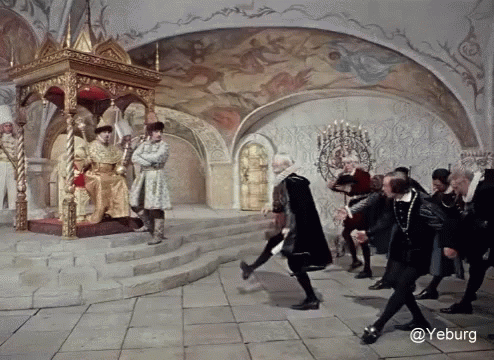 A Group Of People Standing In Front Of A Throne With The Word Yeburg On The Bottom Right GIF