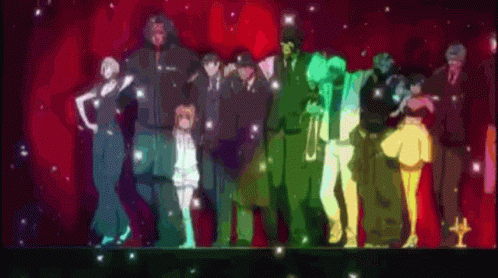A Group Of People Standing Next To Each Other On A Stage With A Red Background GIF