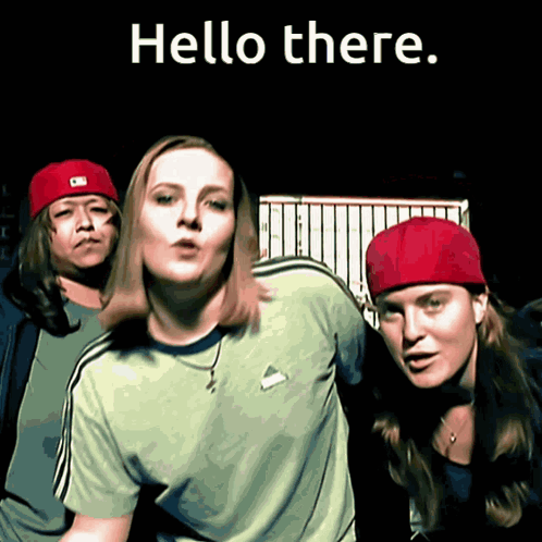 A Group Of People Standing Next To Each Other With The Words Hello There Written Above Them GIF