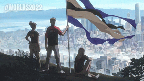 A Group Of People Standing On A Hill Holding A Flag That Says Worlds2022 GIF