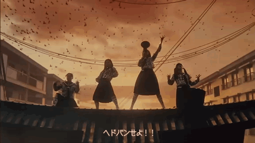 A Group Of People Standing On Top Of A Roof With Birds Flying Around Them GIF