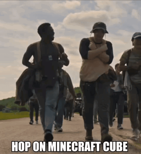 A Group Of People Walking Down A Street With The Words Hop On Minecraft Cube On The Bottom GIF