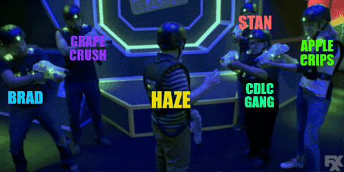 A Group Of People Wearing Glow In The Dark Helmets Playing Laser Tag GIF