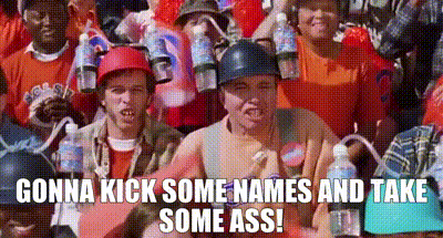 A Group Of People Wearing Helmets With Water Bottles On Top Of Them . GIF