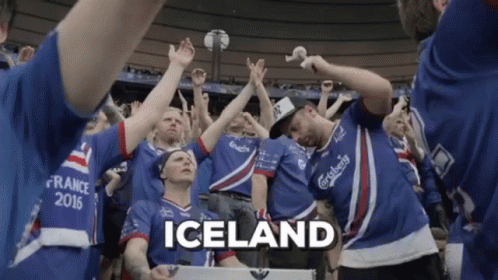 A Group Of People Wearing Iceland Jerseys Are Dancing GIF