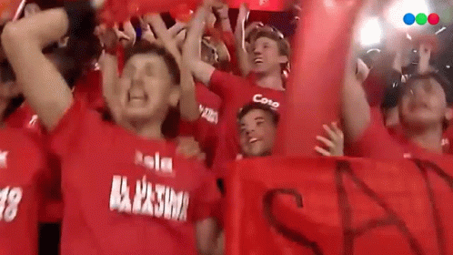 A Group Of People Wearing Red Shirts With The Word Cono On The Front GIF
