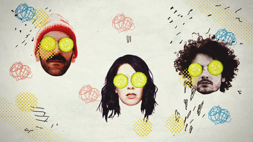 a group of people with cucumber slices in their eyes and the word zin in the middle