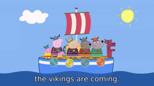 A Group Of Pigs Dressed As Vikings Are Standing On A Boat With The Words " The Vikings Are Coming " Below Them GIF