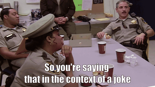 A Group Of Police Officers Sitting Around A Table With A Caption That Says So You 'Re Saying GIF