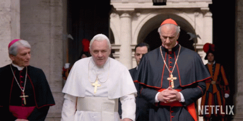 A Group Of Priests Standing In Front Of A Building With Netflix Written On The Bottom GIF