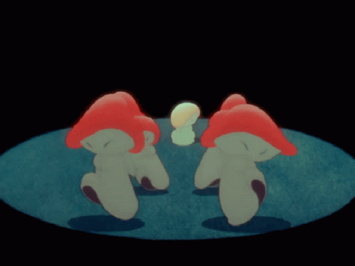 a group of red and white mushrooms are standing in a circle on a blue surface