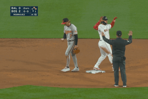 A Group Of Red Sox Baseball Players Standing In The Dugout GIF