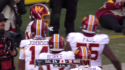 A Group Of Redskins Football Players Including Burks And Johnson GIF