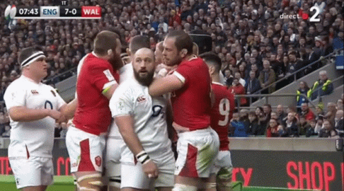 A Group Of Rugby Players On A Field With The Numbers 7 And 9 On Their Jerseys GIF
