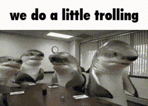 A Group Of Sharks Are Standing In A Room With The Words We Do A Little Trolling Above Them . GIF