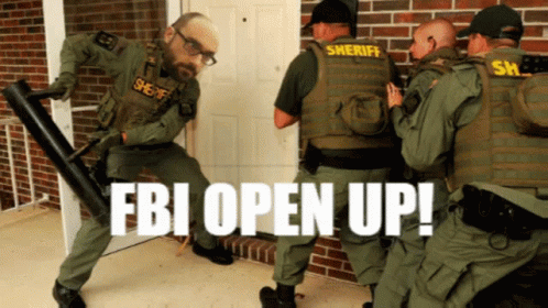 A Group Of Sheriff 'S Officers Are Standing In Front Of A Door With The Fbi Open Up Written On The Bottom GIF