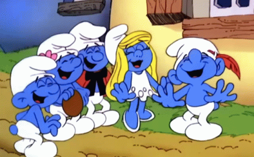 A Group Of Smurfs Are Laughing And Smiling In A Cartoon GIF