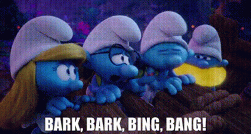 A Group Of Smurfs Are Standing Next To Each Other On A Rock And Talking . GIF