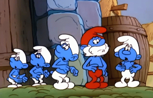 A Group Of Smurfs Standing Next To Each Other In Front Of A Building GIF