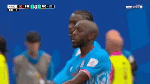 A Group Of Soccer Players Are Celebrating A Goal Against Rdc GIF