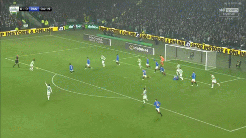 A Group Of Soccer Players Are Celebrating A Goal On A Sky Sports Broadcast GIF