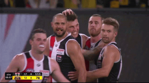 A Group Of Soccer Players Are Celebrating A Goal With Pepper Money Written On Their Jerseys GIF