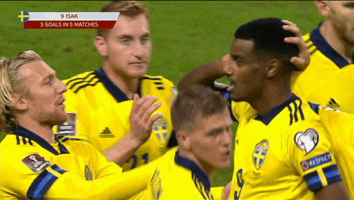 A Group Of Soccer Players Are Celebrating A Goal With The Headline 9 Isak GIF