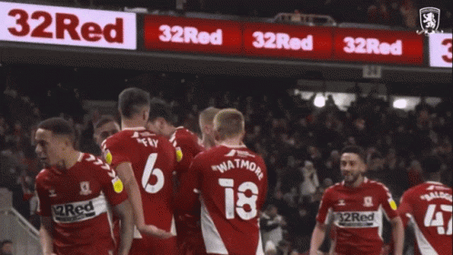 A Group Of Soccer Players Are Celebrating A Goal With The Number 6 On The Back Of Their Jersey GIF
