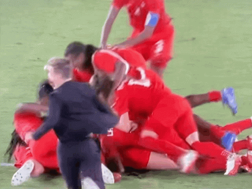 Soccer Players Huddled With Number 3 Jersey GIF