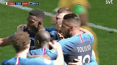 A Group Of Soccer Players Are Hugging And One Of Them Has The Number 10 On His Shirt GIF