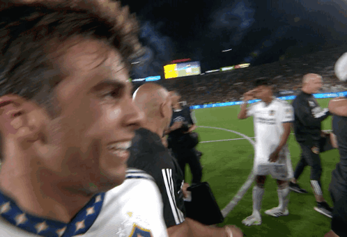 A Group Of Soccer Players Are On A Field And One Of Them Is Wearing A Jersey That Says Adidas GIF