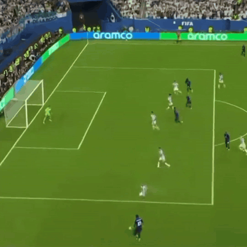 A Group Of Soccer Players Are On A Field With Aramco Advertisements On The Sidelines GIF