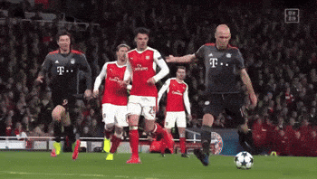 a group of soccer players are playing a game and one of them is wearing a t-mobile jersey