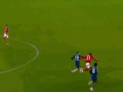 A Group Of Soccer Players Are Playing A Game Of Soccer On A Field . GIF