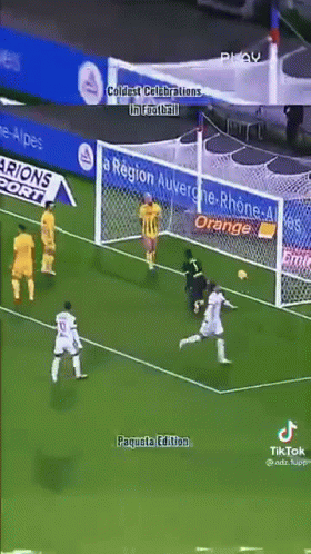 a group of soccer players are playing a game of soccer on a soccer field .