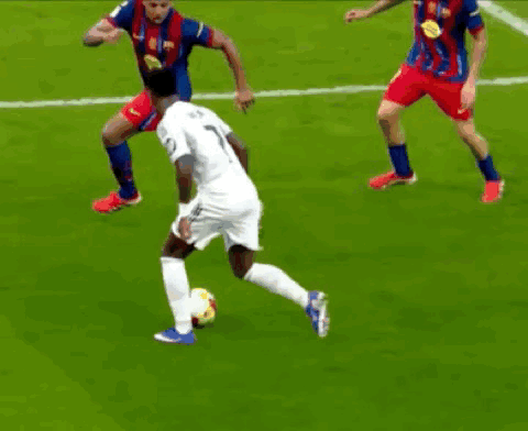 A Group Of Soccer Players Are Playing A Game On A Field GIF