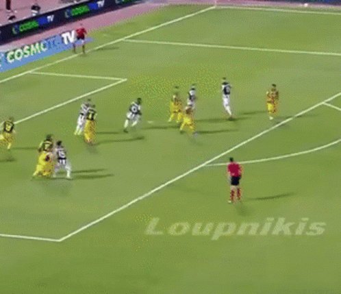 A Group Of Soccer Players Are Playing On A Field With A Cosmo Tv Advertisement In The Background GIF