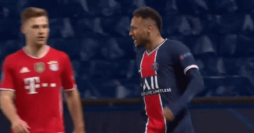 A Group Of Soccer Players Are Standing On A Field . GIF