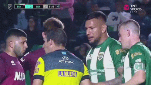 A Group Of Soccer Players Including One Wearing A Yellow La Nueva Jersey GIF