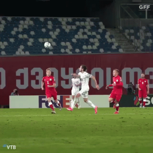 A Group Of Soccer Players On A Field With A Gff Sign In The Background GIF