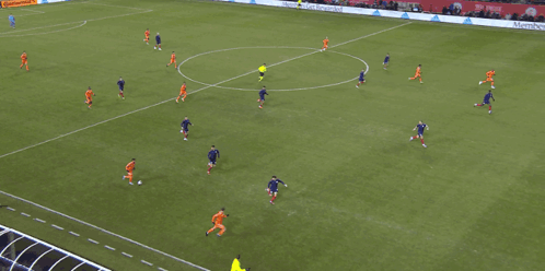 A Group Of Soccer Players On A Field With An Ad For Continental On The Sidelines GIF