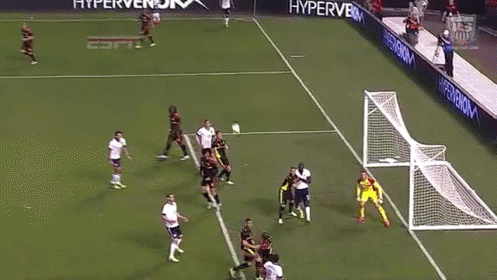A Group Of Soccer Players On A Field With One Wearing The Number 2 Jersey GIF
