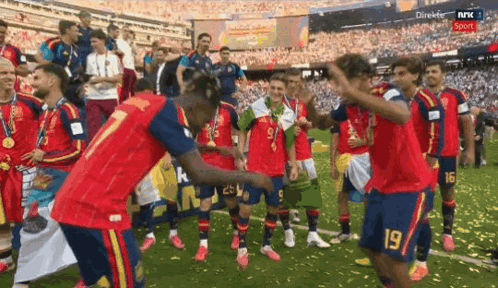 a group of soccer players on a field with one wearing the number 7