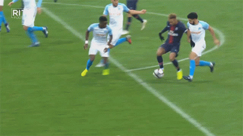 A Group Of Soccer Players On A Field With The Letters Rit On The Bottom Right GIF