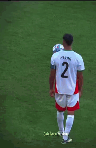 a group of soccer players on a field with the number 2 on the field