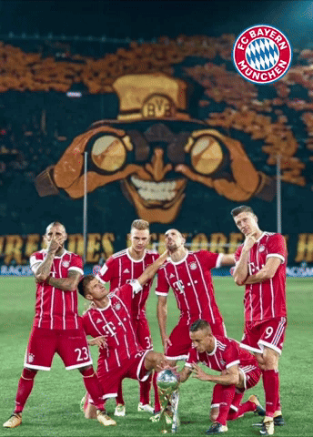 A Group Of Soccer Players Posing For A Picture With The Fc Bayern Munchen Logo On The Bottom GIF