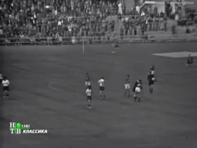 A Group Of Soccer Players Standing On A Field With The Number 4 On Their Jersey GIF