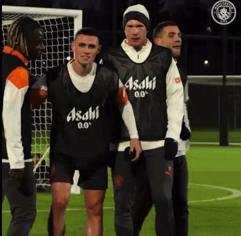 A Group Of Soccer Players Wearing Asahi 0.0 Vests GIF