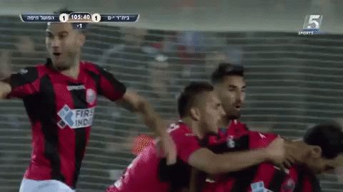 A Group Of Soccer Players Wearing Red And Black Jerseys With The Number 5 On The Bottom Right GIF