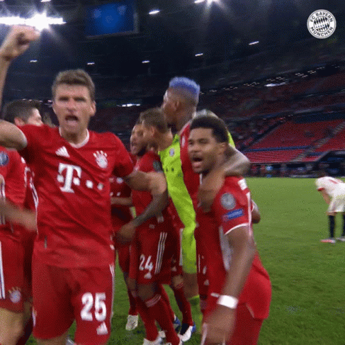 A Group Of Soccer Players Wearing Red Jerseys With T-Mobile On The Front GIF